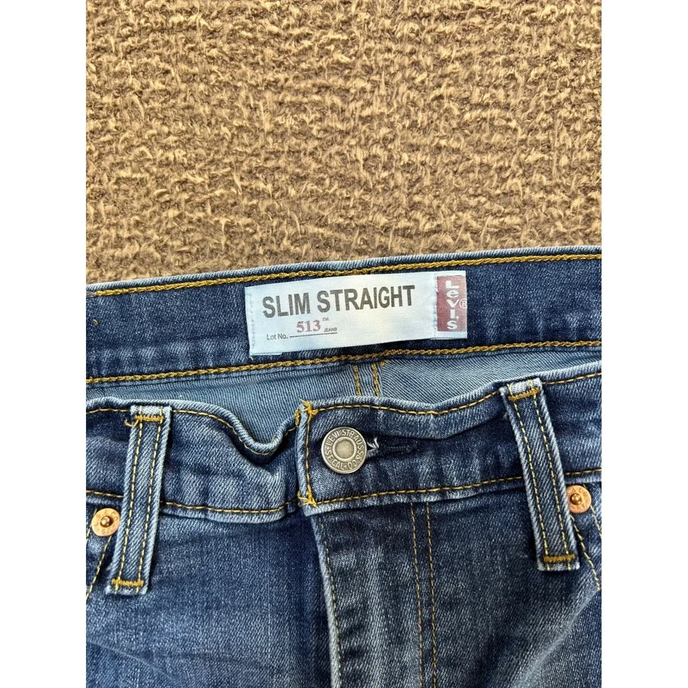 Levis 513 Slim Straight Jeans Mens 34x32 Medium Wash Blue Distressed Denim
